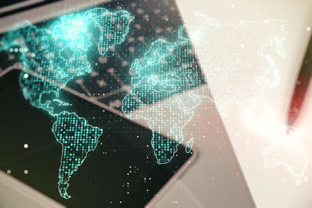 Multi exposure of abstract creative digital world map on laptop background, research and analytics conceptの写真素材