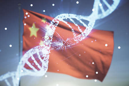 Double exposure of creative DNA hologram on Chinese flag and blue sky background. Bio Engineering and DNA Research conceptの写真素材