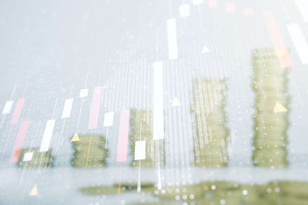 Multi exposure of virtual abstract financial graph hologram and world map on coins background, financial and trading conceptの写真素材