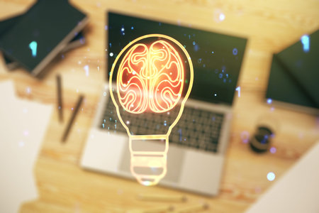 Creative idea concept with light bulb and human brain illustration on modern laptop background....