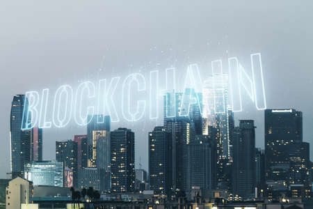 Abstract virtual blockchain technology sketch on Los Angeles office buildings background, future technology and blockchain concept. Double exposureの写真素材