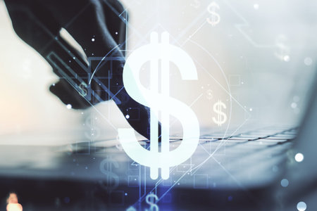 Creative concept of USD symbols illustration and hands typing on laptop on background. Trading and...