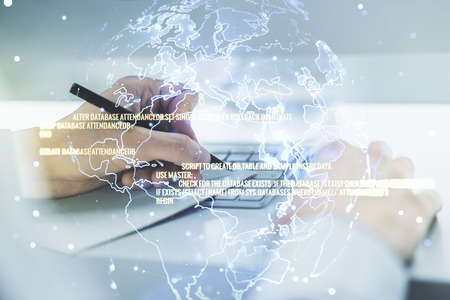 Multi exposure of abstract creative coding sketch with world map and hand writing in notebook on background with laptop, artificial intelligence and neural networks conceptの写真素材