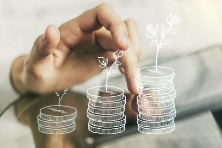Creative concept of cash savings and finger clicks on a digital tablet on background. Retirement...