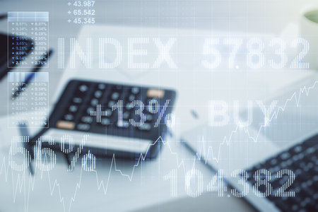 Abstract virtual financial graph hologram on blurry calculator and computer background, financial and trading concept. Multiexposureの写真素材