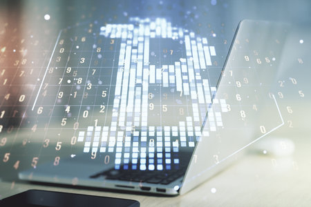 Double exposure of creative Bitcoin symbol hologram with computer on background. Mining and blockchain conceptの写真素材