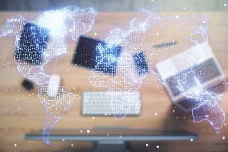 Multi exposure of abstract creative digital world map on modern laptop background, tourism and traveling conceptの写真素材