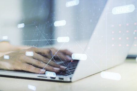Double exposure of abstract creative programming illustration and hands typing on laptop on background, big data and blockchain conceptの写真素材