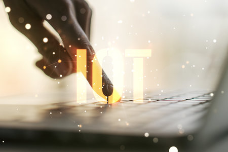 Creative IOT concept with hands typing on laptop on background. Multiexposureの写真素材