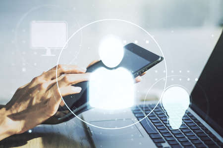 Double exposure of social network icons concept with finger clicks on a digital tablet on background. Marketing and promotion conceptの写真素材