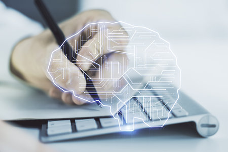 Double exposure of creative artificial Intelligence symbol with hand writing in notebook on background with laptop. Neural networks and machine learning conceptの写真素材