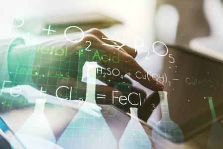 Creative chemistry illustration with finger presses on a digital tablet on background, science and...