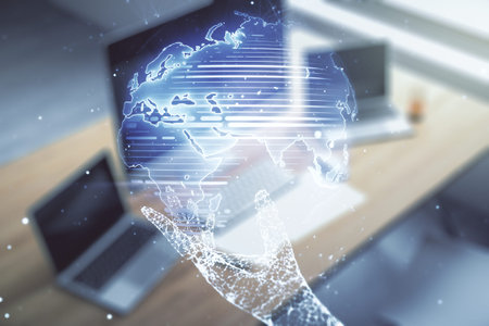 Multi exposure of abstract graphic world map and modern desk with computer on background, connection...