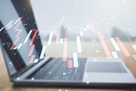 Creative abstract global crisis chart with world map sketch on modern laptop background, falling markets and collapse of global economy concept. Double exposureの写真素材