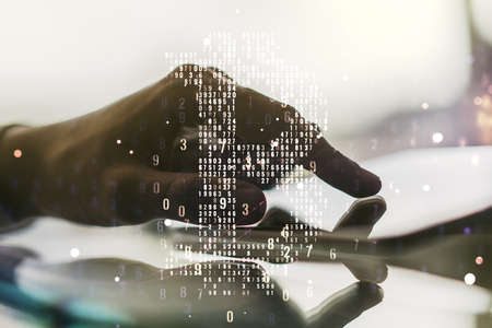 Creative Bitcoin concept with finger clicks on a digital tablet on background. Multiexposureの写真素材