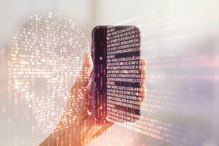 Double exposure of creative code skull hologram and hand with cell phone on background. Malware and...