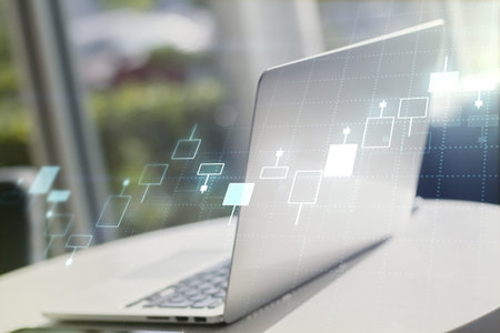 Double exposure of abstract creative financial diagram on modern laptop background, banking and accounting conceptの写真素材