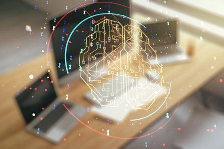 Double exposure of creative human brain microcircuit and modern desk with computer on background....