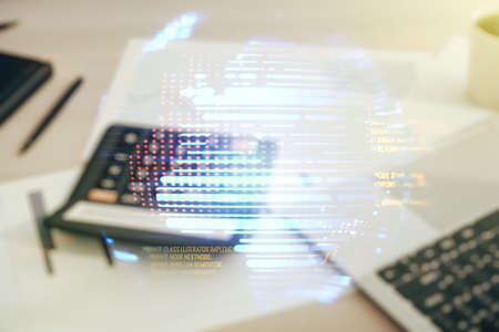 Abstract virtual coding illustration and world map on blurry calculator and computer background, international software development concept. Multiexposureの写真素材