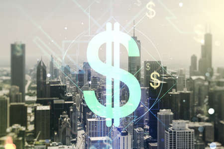Double exposure of virtual USD symbols hologram on Chicago city skyscrapers background. Banking and investing conceptの写真素材