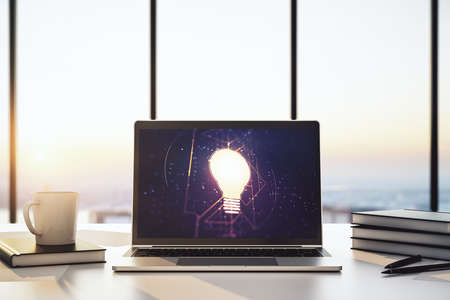 Creative light bulb illustration on modern computer monitor, future technology concept. 3D Renderingの写真素材