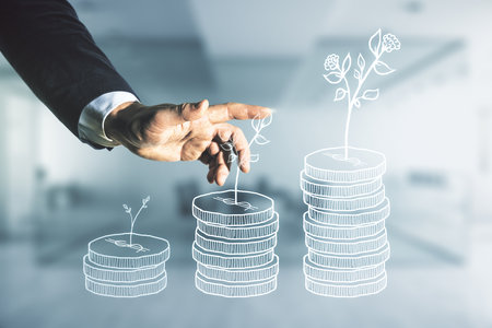 Man hand presses on virtual cash savings illustration on blurred office background. Retirement savings and capital increase concept. Multiexposureの写真素材