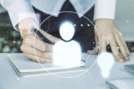 Social network concept with hand writing in notebook on background with laptop. Multiexposureの写真素材