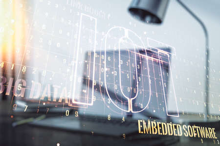 Double exposure of creative IOT hologram on laptop background, research and development conceptの写真素材