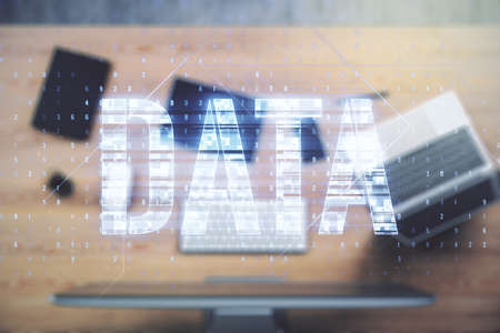 Creative Data word sign on modern laptop background. Multiexposureの写真素材