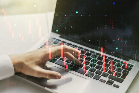 Creative abstract global crisis chart with world map sketch and with hands typing on computer keyboard on background, falling markets and collapse of global economy concept. Double exposureの写真素材