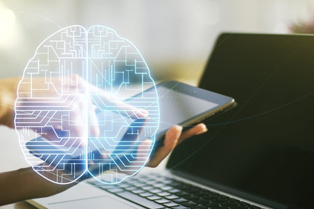 Double exposure of creative artificial Intelligence symbol with finger clicks on a digital tablet on...