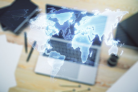 Multi exposure of abstract creative digital world map on laptop background, research and analytics...