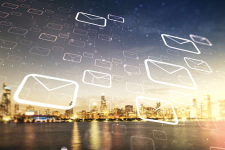 Abstract virtual postal envelopes sketch on Chicago office buildings background, e-mail and marketing concept. Double exposureの写真素材