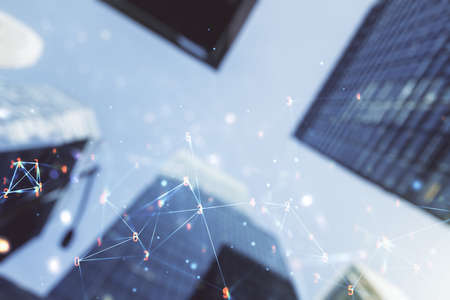 Abstract virtual wireless technology hologram on modern architecture background, artificial intelligence and machine learning concept. Multi exposureの写真素材