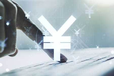 Creative Japanese Yen symbol illustration and hands typing on computer keyboard on background, forex and currency concept. Multiexposureの写真素材