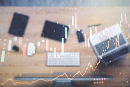 Abstract creative financial graph with world map on modern laptop background, forex and investment...