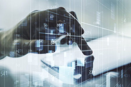 Double exposure of abstract creative statistics data hologram with finger clicks on a digital tablet...
