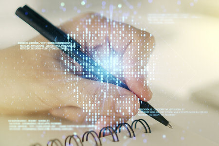 Creative concept of code skull illustration and man hand writing in notebook on background. Hacking and phishing concept. Multiexposureの写真素材