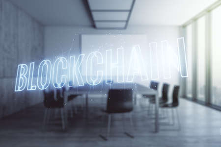 Abstract virtual blockchain technology hologram on a modern conference room background. Digital money transfers and decentralization concept. Multiexposureの写真素材