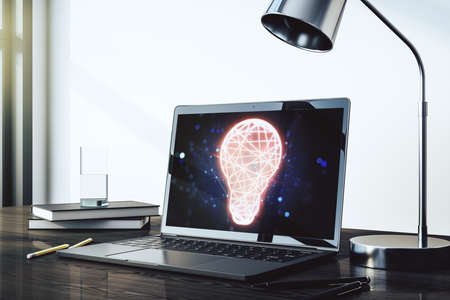 Modern computer monitor with creative light bulb hologram, research and development concept. 3D Renderingの写真素材
