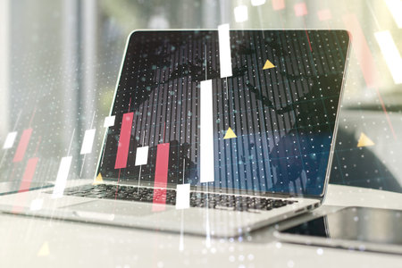Multi exposure of abstract creative financial graph with world map on modern laptop background,...