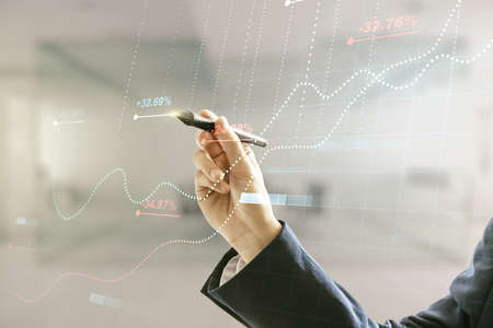 Multi exposure of male hand with pen working with stats data illustration on blurred office background, computing and analytics conceptの写真素材