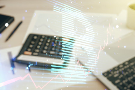 Virtual Bitcoin hologram on calculator and laptop background. Multiexposure