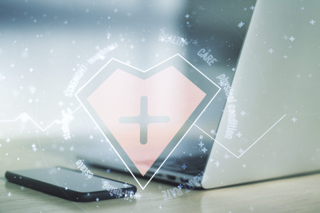 Creative concept of heart pulse illustration on modern laptop background. Medicine and healthcare...