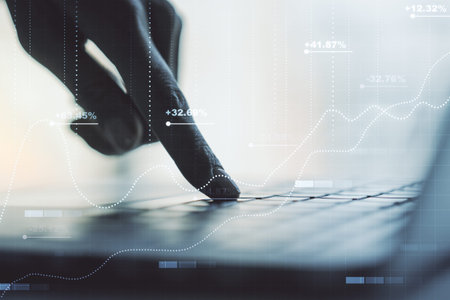 Abstract creative stats data concept with hands typing on laptop on background. Multiexposure