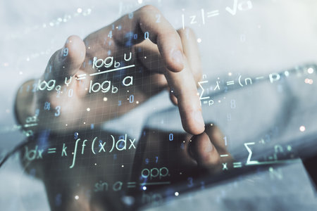 Creative scientific formula concept with finger clicks on a digital tablet on background. Multiexposureの写真素材