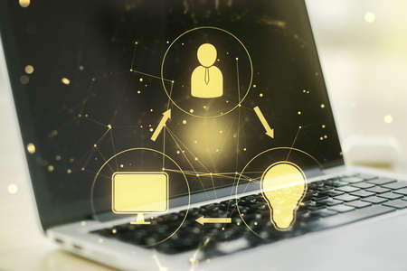 Double exposure of social network icons concept with computer on background. Networking conceptの写真素材