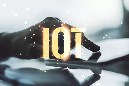 Double exposure of creative IOT hologram with finger clicks on a digital tablet on background,...
