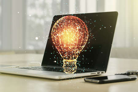 Creative light bulb illustration on modern computer background, future technology concept. Multi-exposureの写真素材