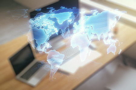 Abstract creative digital world map and modern desktop with pc on background, globalization concept....